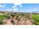 Scenic view of the building on a bluff overlooking lush green landscapes at 405 Paradise Pkwy # 170, Mesquite, NV 89027