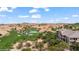 The golf course is surrounded by mountains and desert landscaping at 405 Paradise Pkwy # 170, Mesquite, NV 89027