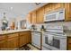 Lovely kitchen featuring granite countertops, a tiled floor, and modern appliances at 405 Paradise Pkwy # 170, Mesquite, NV 89027