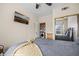 Main bedroom suite featuring a bed, built in closet, and laundry machines behind a door at 405 Paradise Pkwy # 170, Mesquite, NV 89027