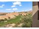Stunning desert landscape with a golf course below, as seen from the balcony at 405 Paradise Pkwy # 170, Mesquite, NV 89027