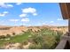 Stunning desert landscape with a golf course below, as seen from the balcony at 405 Paradise Pkwy # 170, Mesquite, NV 89027