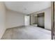 Spacious bedroom with carpet and a closet with mirrored sliding doors at 5199 Caliente St # 63, Las Vegas, NV 89119