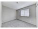 Bedroom with a window, carpet, and a closet with white sliding doors at 5199 Caliente St # 63, Las Vegas, NV 89119