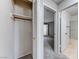 Hallway featuring a closet on the left and a bathroom view on the right at 5199 Caliente St # 63, Las Vegas, NV 89119