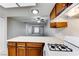 The kitchen opens up into the living room and features a white gas range at 5199 Caliente St # 63, Las Vegas, NV 89119