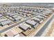 Aerial view of homes in a suburban community with desert landscaping at 5360 S Chippewa St, Pahrump, NV 89061