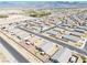 Birds-eye view of the residential area displaying the well-maintained single-Gathering homes within a desert community at 5360 S Chippewa St, Pahrump, NV 89061
