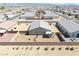 Aerial view of the backyard, which features desert landscaping and a privacy fence at 5360 S Chippewa St, Pahrump, NV 89061
