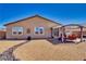 Backyard featuring desert landscaping with a covered patio area and outdoor furniture at 5360 S Chippewa St, Pahrump, NV 89061