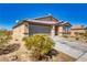 Charming single-story home with a well-maintained driveway and desert landscaping at 5360 S Chippewa St, Pahrump, NV 89061