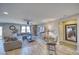 Spacious living room with tile floors, modern furniture, and ample natural light at 5360 S Chippewa St, Pahrump, NV 89061