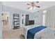 Bedroom featuring a ceiling fan and an en suite bathroom and walk-in closet at 6116 Golden Saddle St, Las Vegas, NV 89130