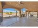 Covered patio perfect for entertaining with large open space and ceiling fans at 6116 Golden Saddle St, Las Vegas, NV 89130