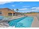 In-ground pool with desert landscaping at 6116 Golden Saddle St, Las Vegas, NV 89130