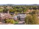 Aerial shot showcasing the home's prime location backing to a golf course with mature trees and lush landscaping at 6907 May Basket Ave, Las Vegas, NV 89131