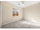 Bedroom with neutral walls and carpet plus window for natural light at 6907 May Basket Ave, Las Vegas, NV 89131