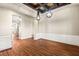 Spacious dining room featuring a decorative coffered ceiling and wood floors at 6907 May Basket Ave, Las Vegas, NV 89131