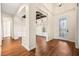 Foyer with wood flooring that leads into a dining room with a decorative ceiling at 6907 May Basket Ave, Las Vegas, NV 89131