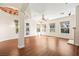 Spacious living room with access to kitchen and dining area and lots of windows to bring in natural light at 6907 May Basket Ave, Las Vegas, NV 89131
