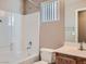 Bathroom featuring tub/shower combination and a window at 8065 Starling View Ct, Las Vegas, NV 89166