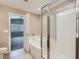Bathroom with tub, shower and access to bedroom at 8065 Starling View Ct, Las Vegas, NV 89166