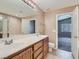 Bathroom features double sinks and access to bedroom and shower at 8065 Starling View Ct, Las Vegas, NV 89166