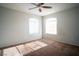 A bright bedroom with plush carpet, large windows, and neutral walls at 8160 Autumn Star Ave, Las Vegas, NV 89145