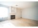 Bright living room with tile flooring, fireplace, and large window at 8160 Autumn Star Ave, Las Vegas, NV 89145