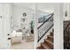 Inviting entryway with stairs, an adjacent sitting area, high ceilings, and natural light at 8426 Sluman Ct, Las Vegas, NV 89128