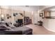 Open-concept living room with comfortable seating, natural light and a breakfast bar overlooking the kitchen at 8600 W Charleston Blvd # 2190, Las Vegas, NV 89117