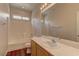 Bathroom with tub-shower combo, single sink, and ample lighting, ideal for everyday use at 8980 High Horizon Ave, Las Vegas, NV 89149