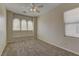 Cozy bedroom with large windows and neutral carpeting, offering a peaceful and inviting space at 8980 High Horizon Ave, Las Vegas, NV 89149