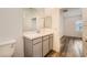 Well-lit bathroom featuring a single sink vanity, neutral walls and modern fixtures at 965 Nevada State Dr # 8202, Henderson, NV 89002