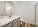 Bathroom featuring a single sink vanity, neutral walls, wood floors, and a shower at 965 Nevada State Dr # 8202, Henderson, NV 89002