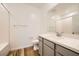 Bathroom features a vanity with gray cabinets, white countertop, and shower-tub combo at 965 Nevada State Dr # 8202, Henderson, NV 89002