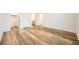 Bright bedroom with wood-style floors, closet, and attached bathroom at 965 Nevada State Dr # 8202, Henderson, NV 89002