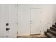 Clean entry featuring natural light, white doors, and a staircase to the next level at 965 Nevada State Dr # 8202, Henderson, NV 89002