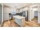 Kitchen boasts an island, stainless steel appliances, and gray cabinets at 965 Nevada State Dr # 8202, Henderson, NV 89002