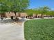Community park with picnic tables, benches, and lush green grass providing a perfect spot for outdoor activities at 965 Nevada State Dr # 8202, Henderson, NV 89002
