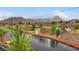 A scenic view from the balcony, showcasing surrounding mountains, and greenery at 965 Nevada State Dr # 8202, Henderson, NV 89002