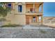 Inviting two-story home with a balcony, front door, and coordinated exterior colors at 971 Sable Chase Pl, Henderson, NV 89011