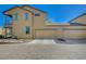This home has a spacious garage with multiple bays and a convenient paved driveway at 971 Sable Chase Pl, Henderson, NV 89011