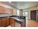 Well-equipped kitchen with granite countertops, stainless steel appliances, and ample cabinet space at 971 Sable Chase Pl, Henderson, NV 89011
