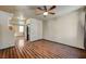 Open-concept living area with wood floors and view into another room at 971 Sable Chase Pl, Henderson, NV 89011