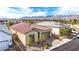 An aerial view of a neighborhood highlighting a single-story home with mountain views at 9993 Skye Gazer Ave, Las Vegas, NV 89166