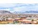 A community aerial showcasing a neighborhood park and stunning mountain views in the background at 9993 Skye Gazer Ave, Las Vegas, NV 89166