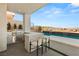 Outdoor kitchen and a refreshing pool creating an ideal space for entertaining and leisure at 10 Sand Star Ln, Henderson, NV 89011
