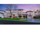 Elegant two-story home featuring well-manicured lawn and a spacious driveway at 10412 Mansion Hills Ave, Las Vegas, NV 89144