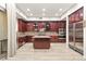 Gourmet kitchen featuring stainless steel appliances and granite countertops at 10412 Mansion Hills Ave, Las Vegas, NV 89144